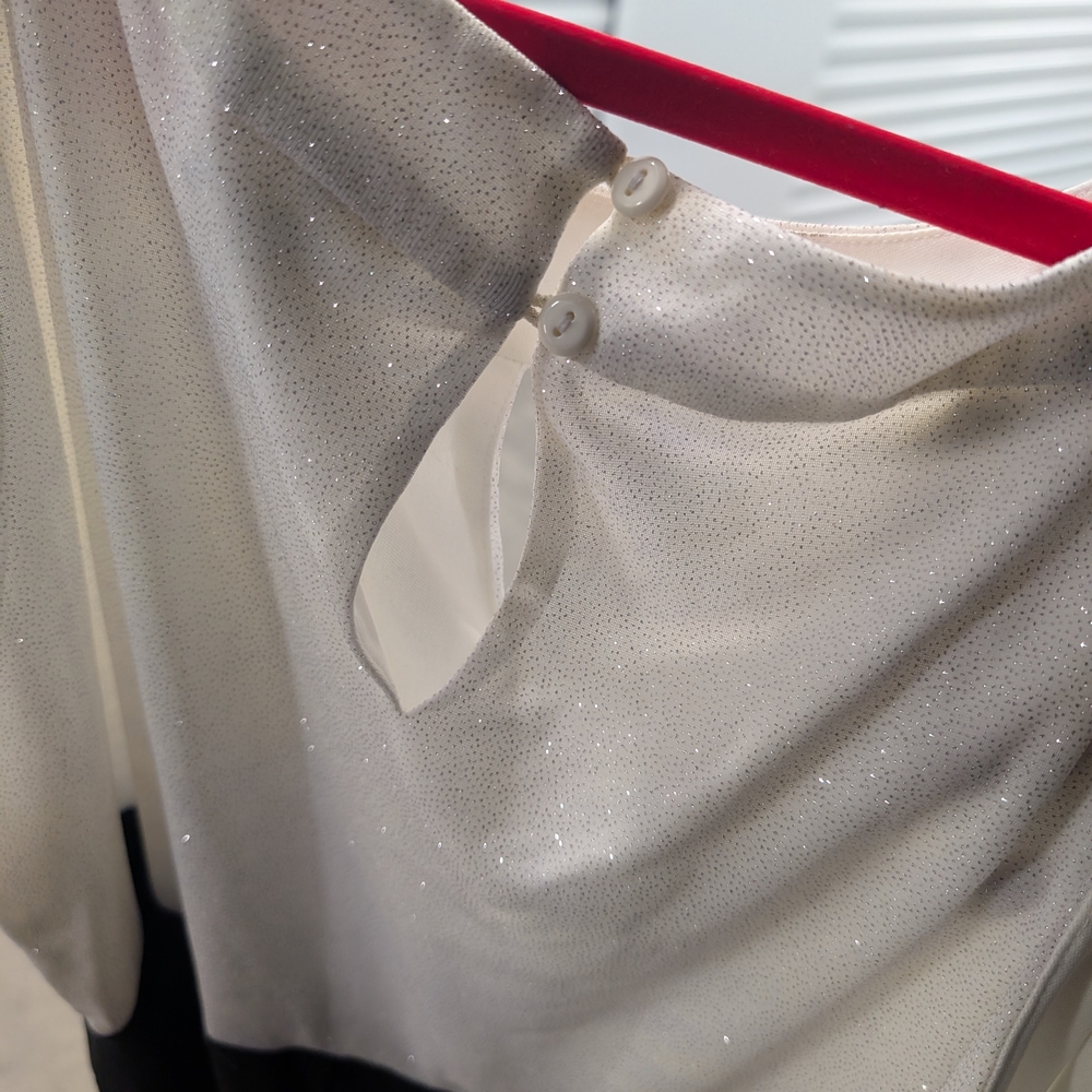 Elegant Cream and Black Blouse with Button Detail